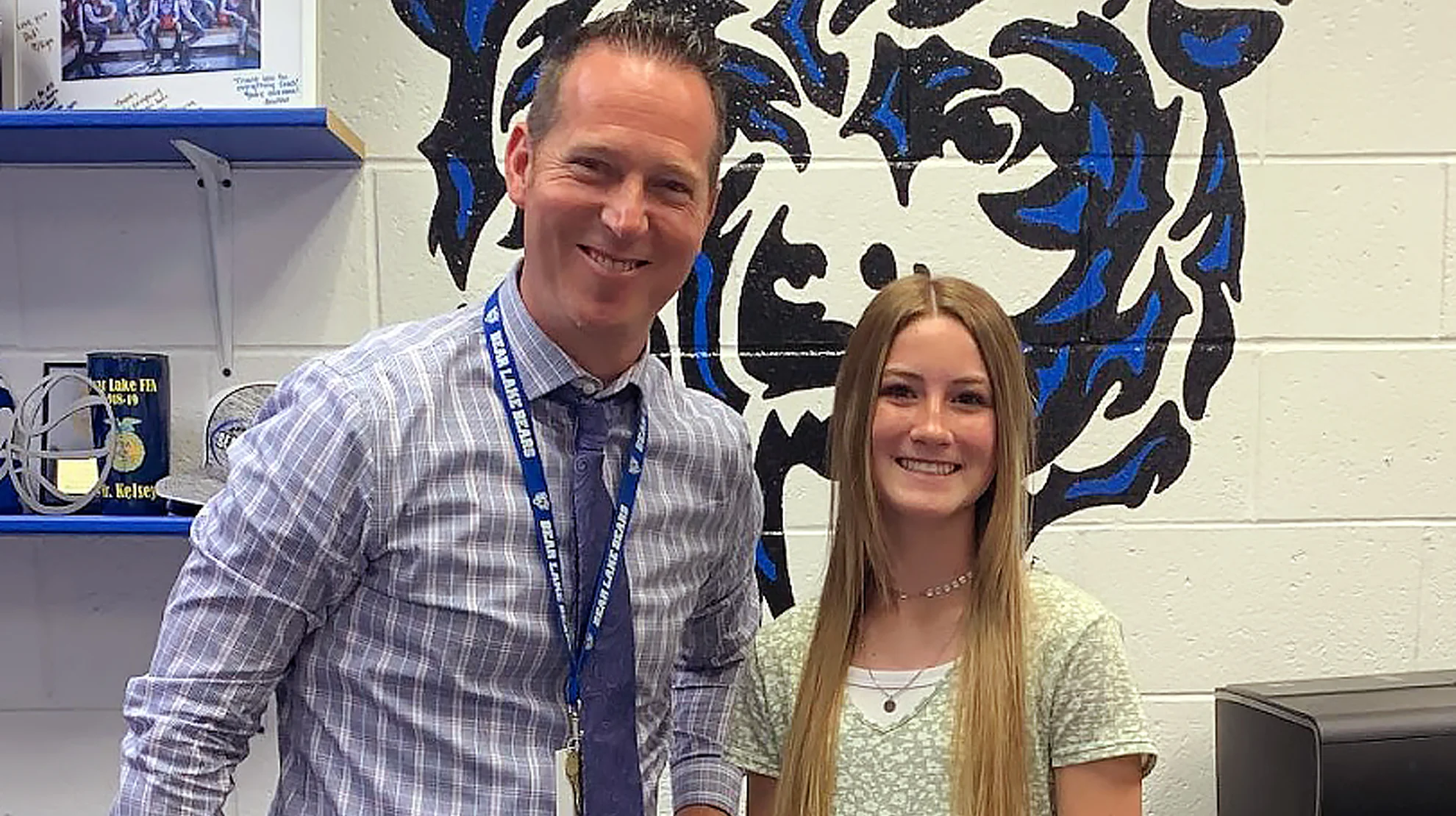 Principal Luke Kelsey and a Bear Lake student