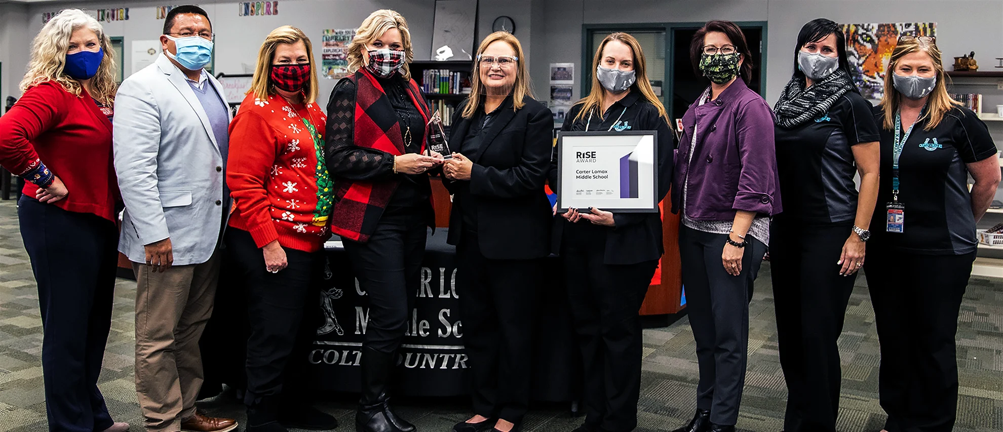 Principal Norma Penny with members of the Carter Lomax and Pasadena Independent School District community at the Rise Award ceremony in 2021.