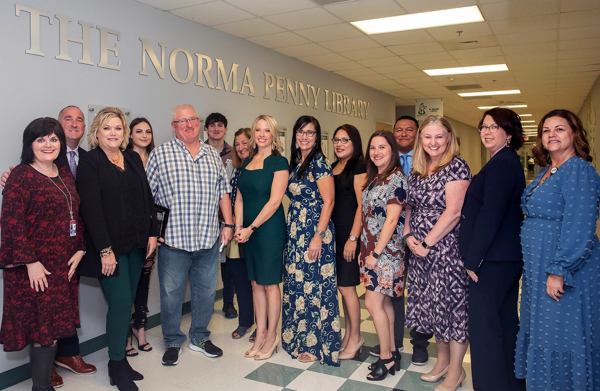 Principal Norma Penny with members of the Penny family at the dedication of the Norma Penny Library.