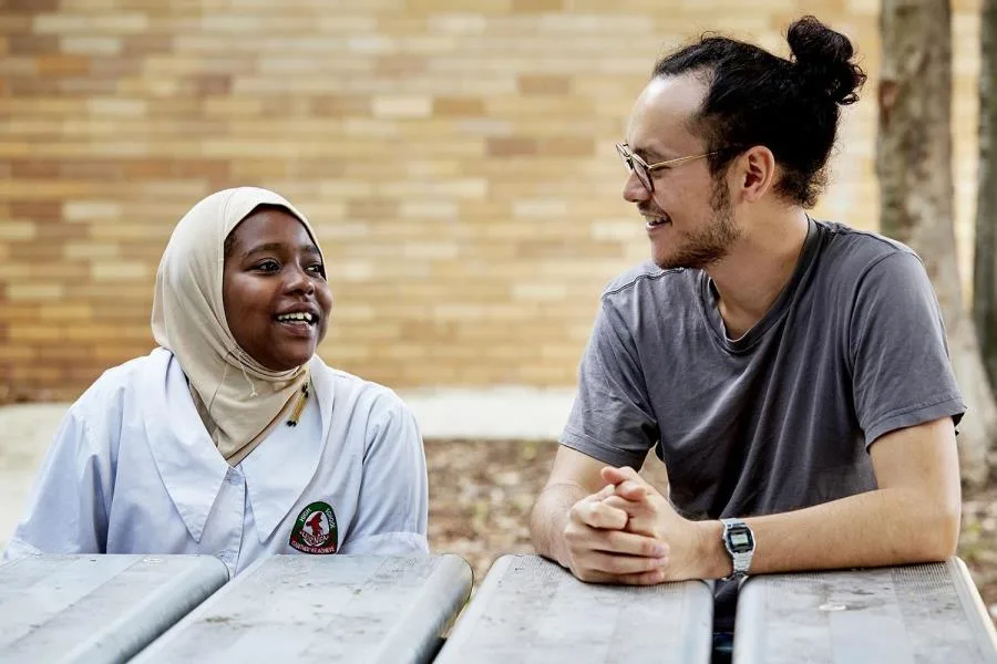 Girl and counsellor laughing