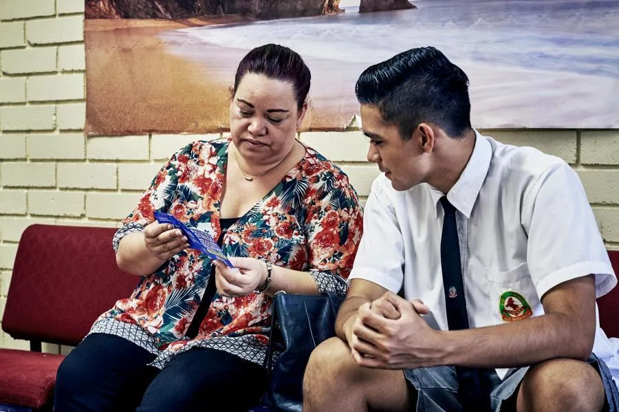 160301_069_mother and son in waiting room talking