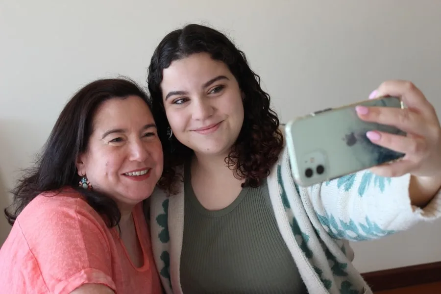 Georgia posing for a photo with her mum