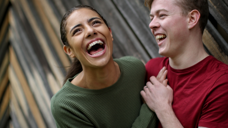 Young couple laughing together