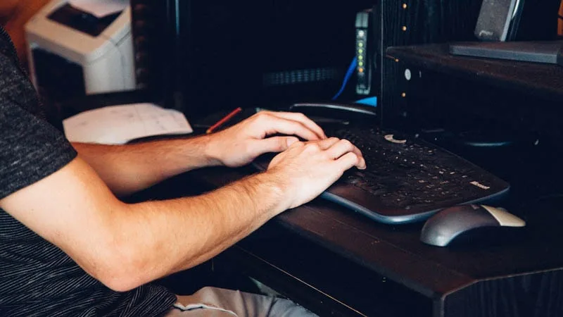 teen boy on computer