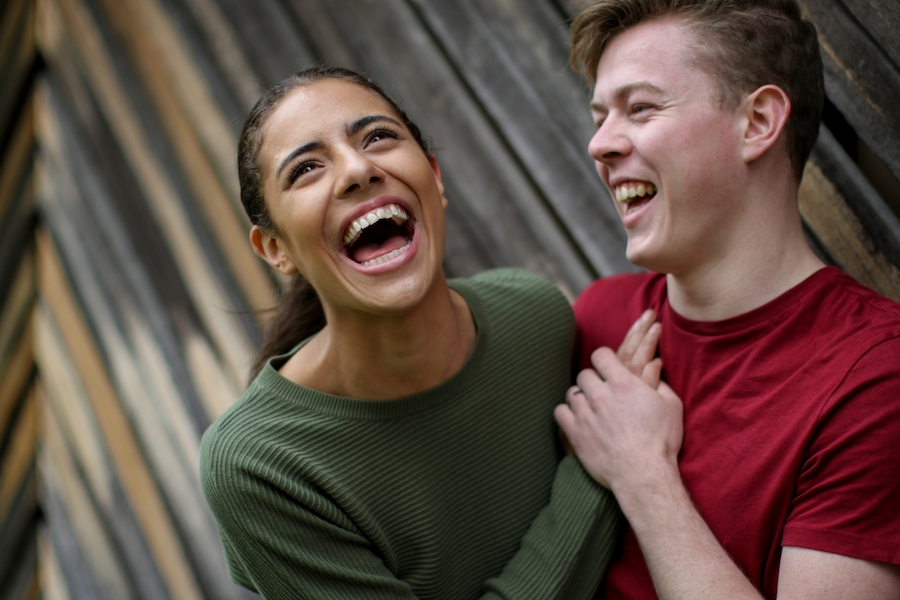 A young couple laughing together