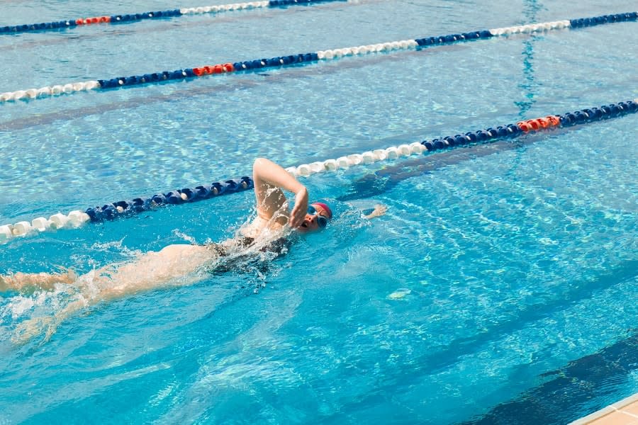 woman swimming laps