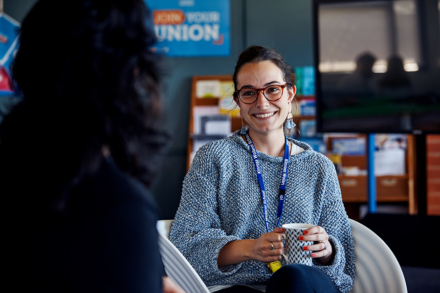 school teacher talking to student