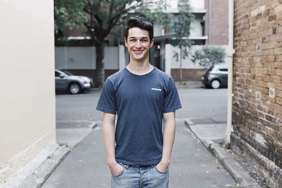 Young man standing in urban street 2