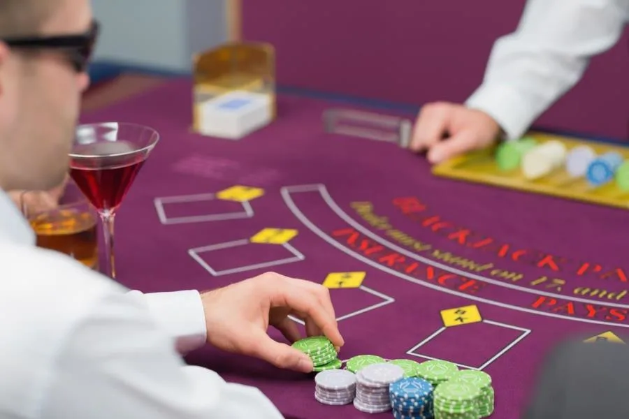 Person gambling with chips