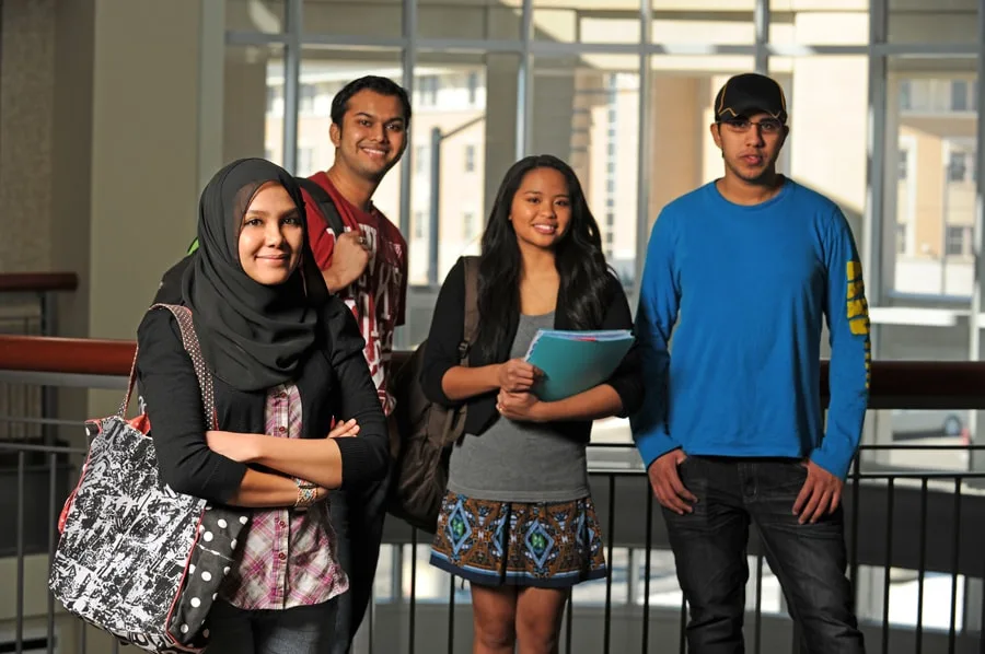 university students standing outside jpg