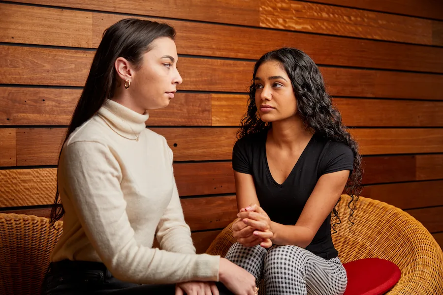 two youths having a conversation