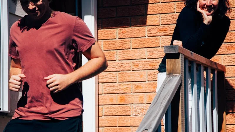 mum and son on porch