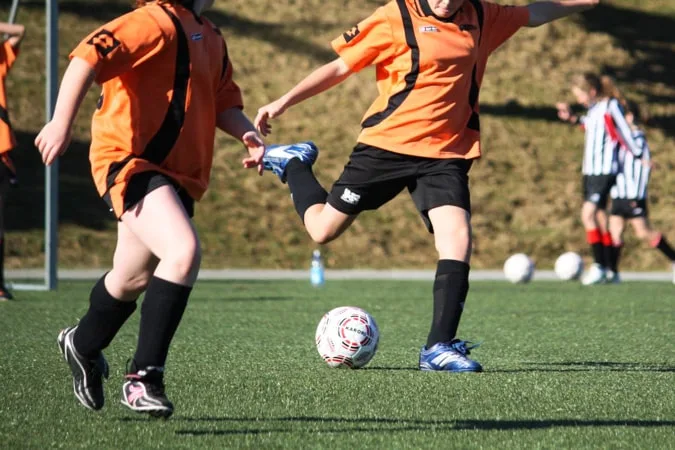 Girls playing soccer