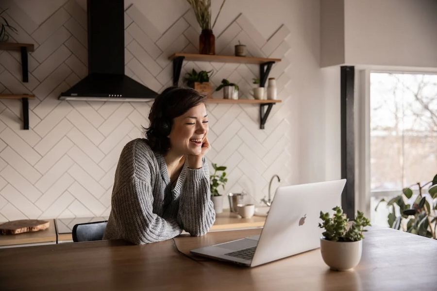 Woman talking to partner on computer