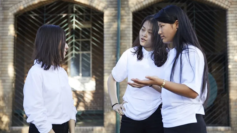 three girls talking