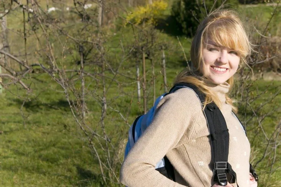 Girl smiling with backpack