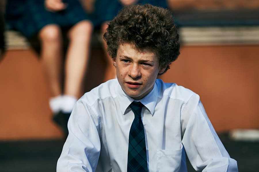 portrait of schoolboy looking to the side