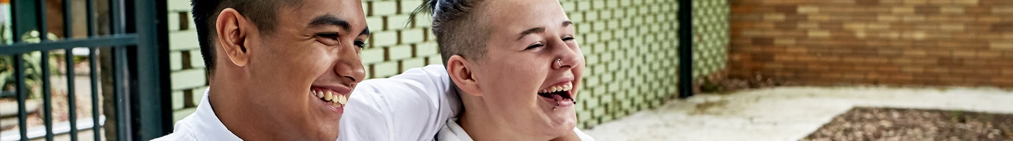 schoolkids girl and boy laughing