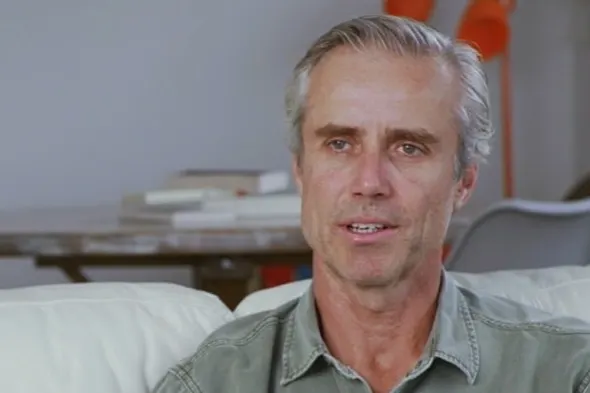 gavin man sitting on couch talking to camera