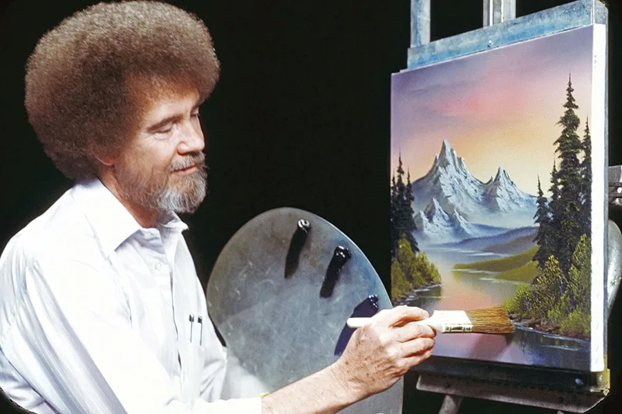 bob ross man painting a landscape