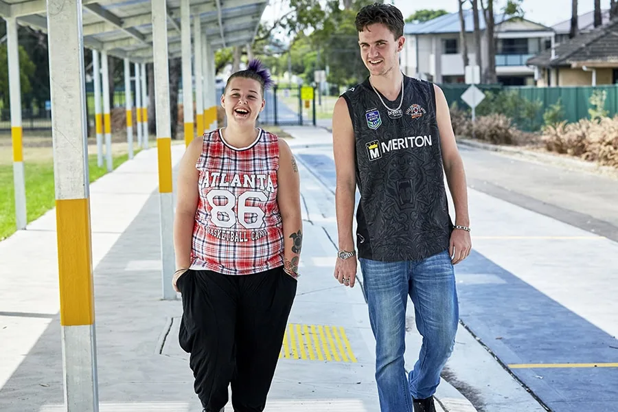 two teenage friends walking