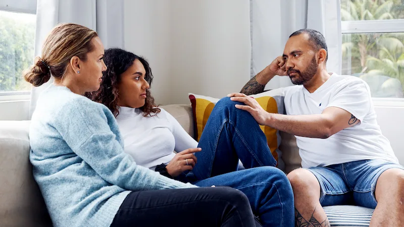 Family sitting down talking