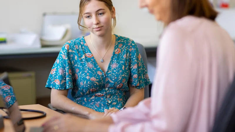 Teen girl seeing a doctor PC