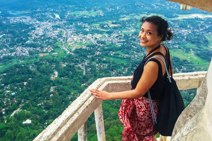 leeza young woman standing in scenery smiling at camera