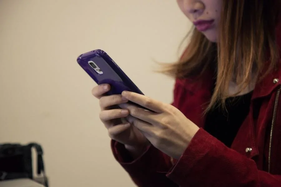 Girl using her mobile phone