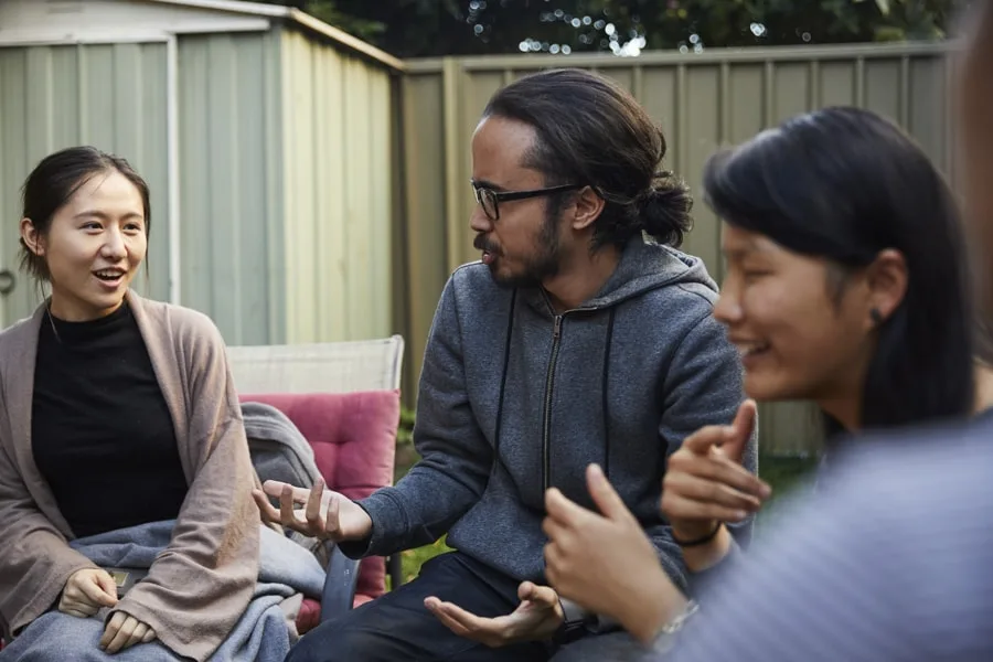 boy debating with his friends