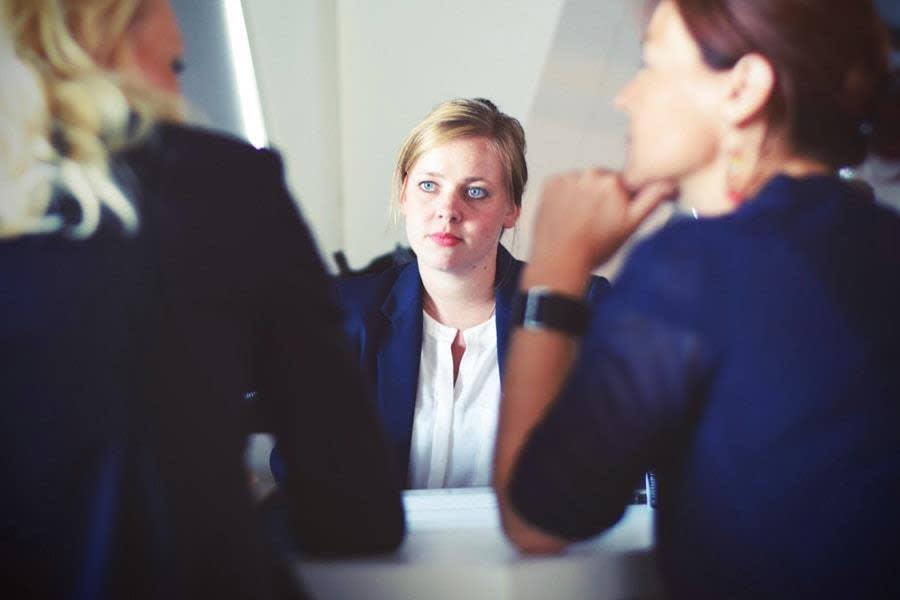 3 women at work having a meeting