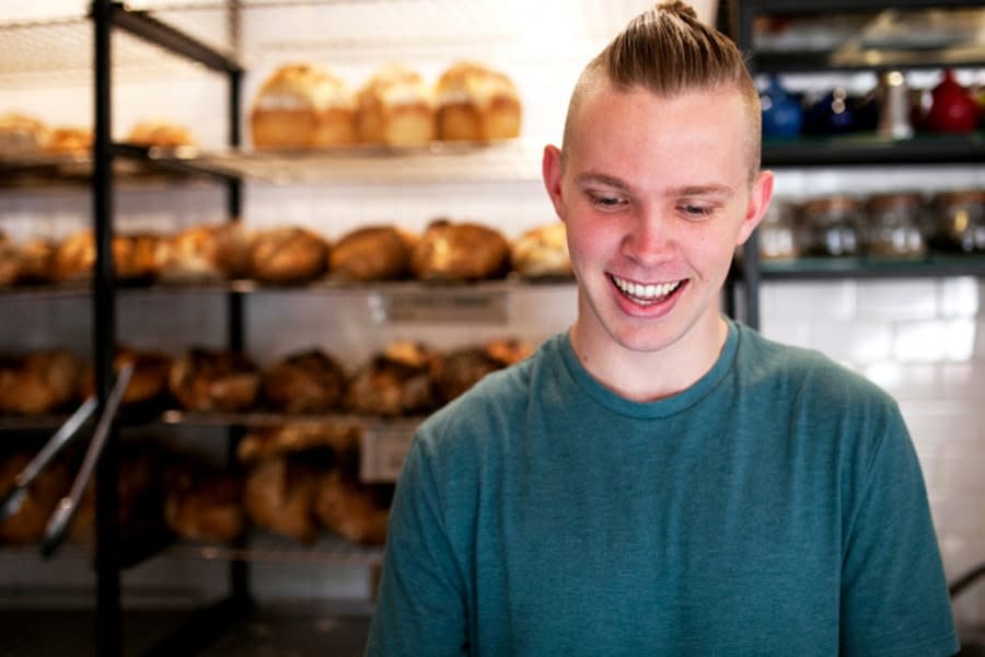 Boy working in a bakery