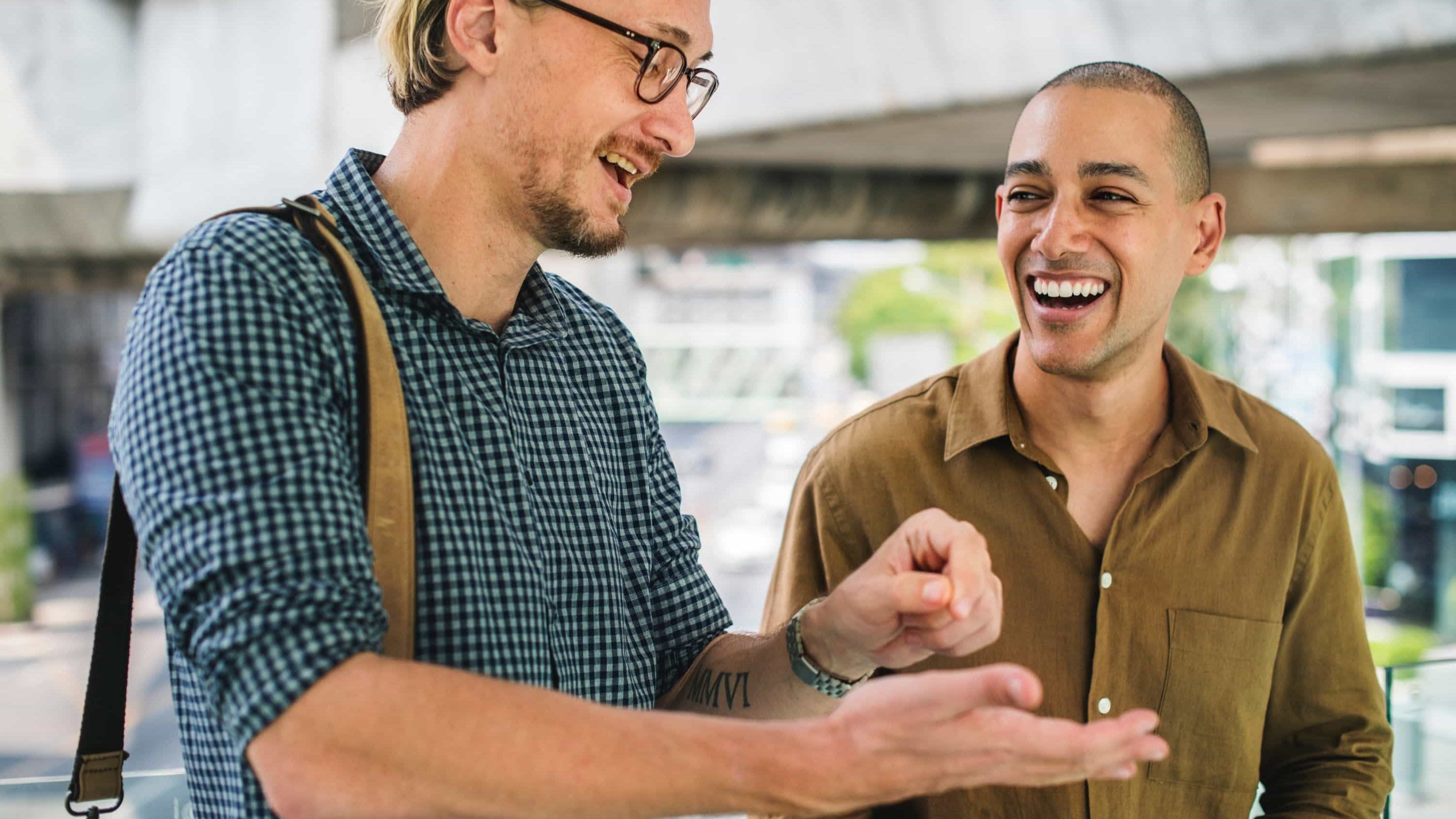 People smiling and giving high five