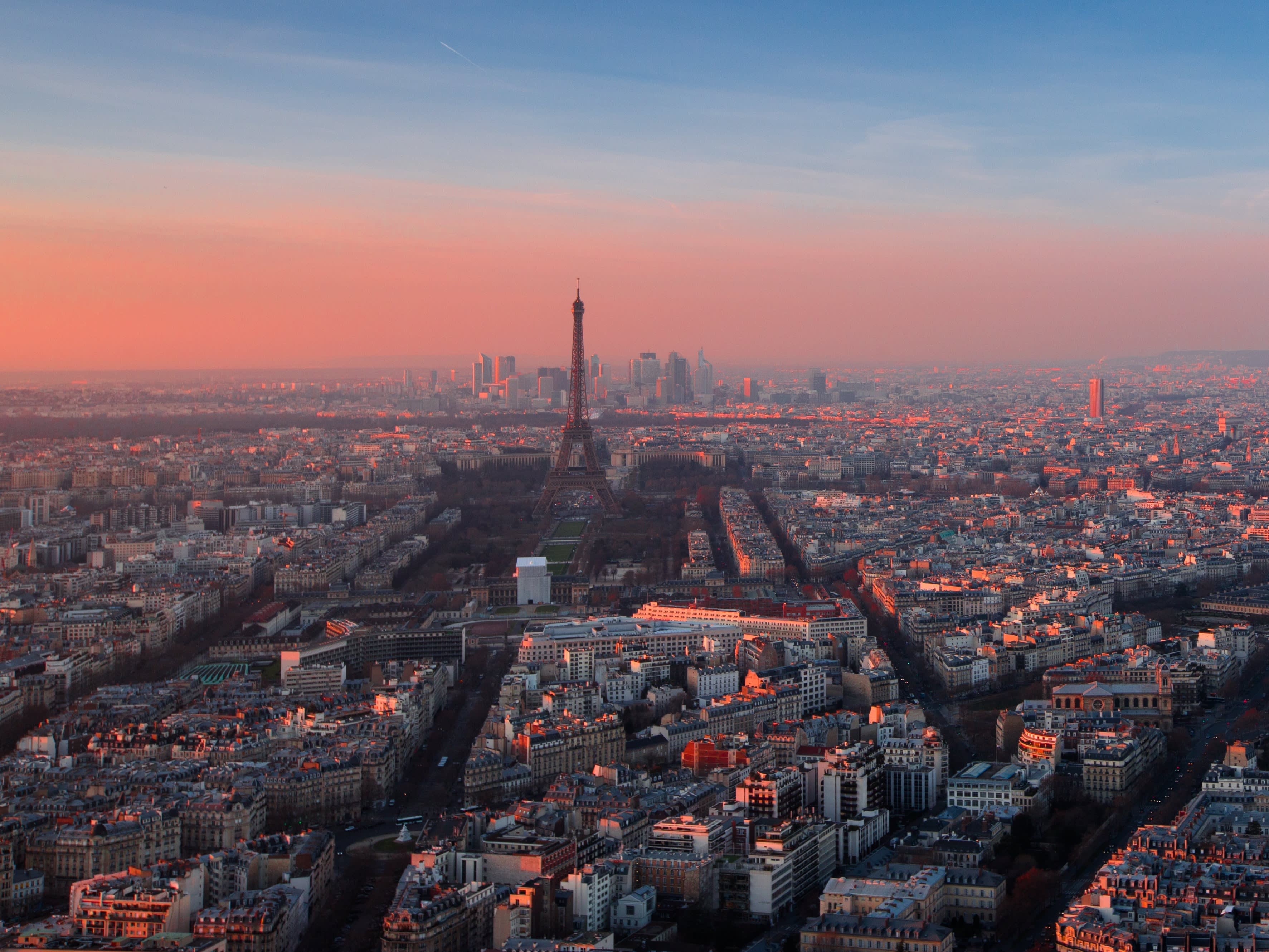 A picture of the skyline of Paris taken from a birds-eye view at sunset
