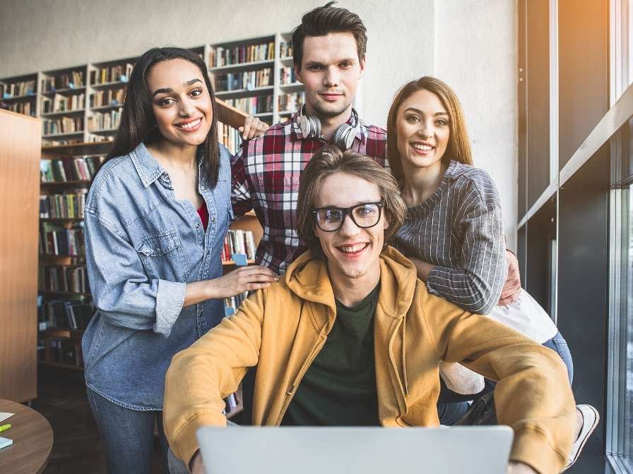 Satisfied students having job with appliance
 