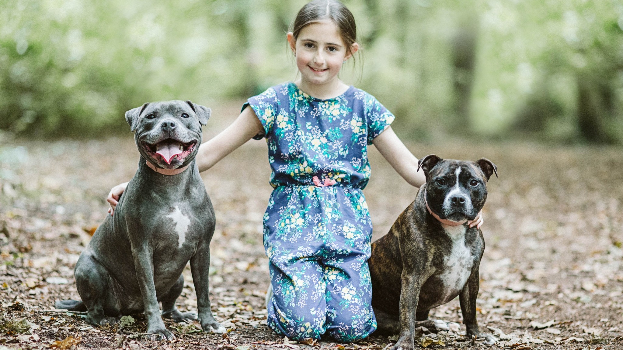 Grace with her rescue dogs Luna and Mollie