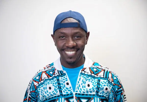 Karumba Ngatia, ADMI graduate and professional DJ and mix engineer performing at a live event