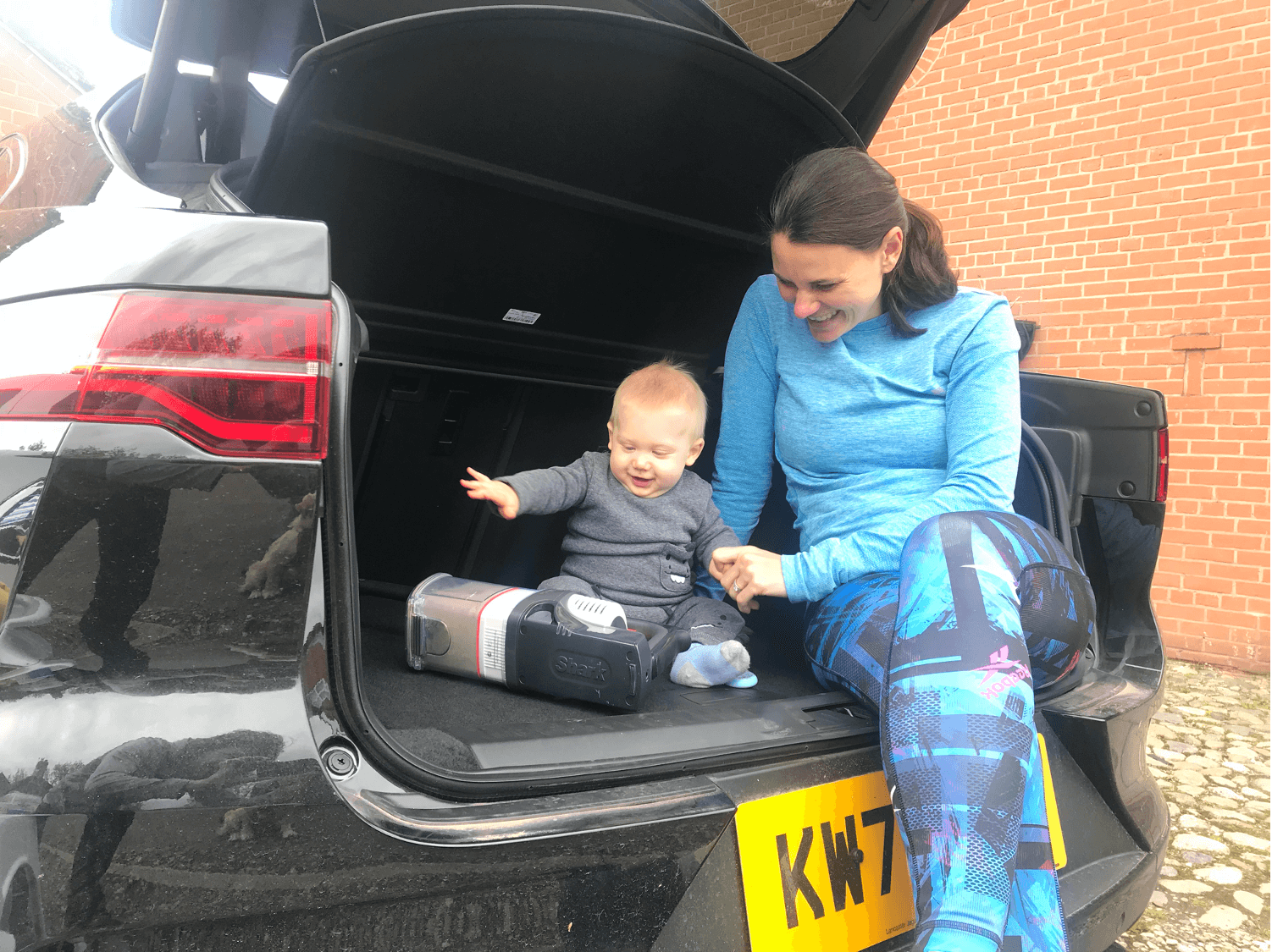 Family in i-pace boot