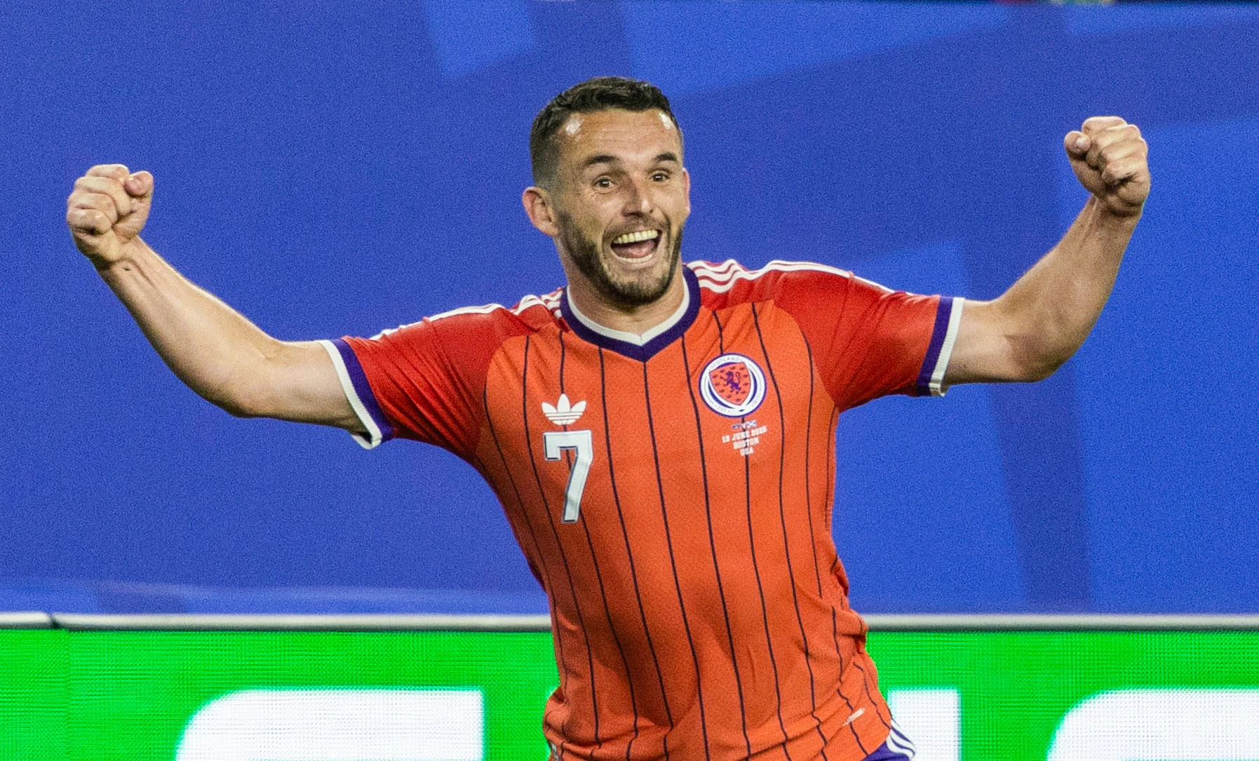 Scotland's John McGinn celebrates giving us a first half lead
