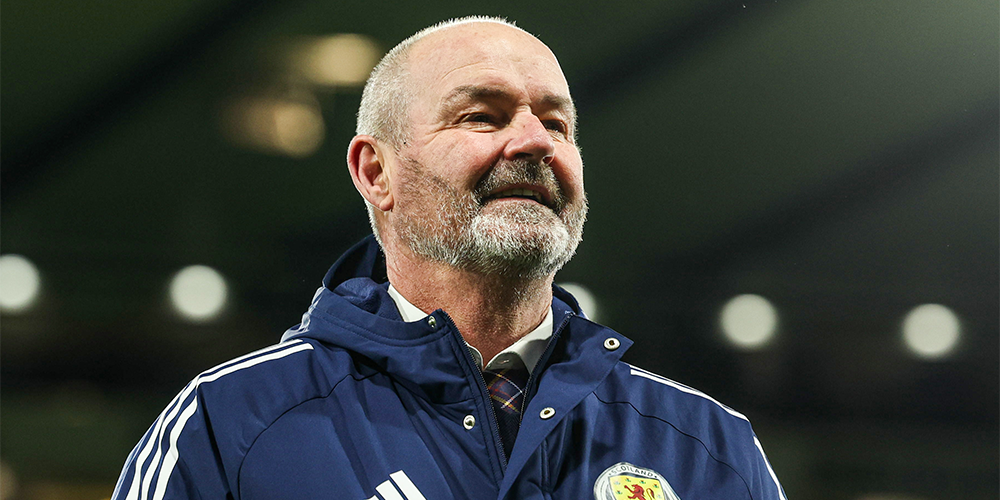 Steve Clarke walking along Barclays Hampden touchline. 