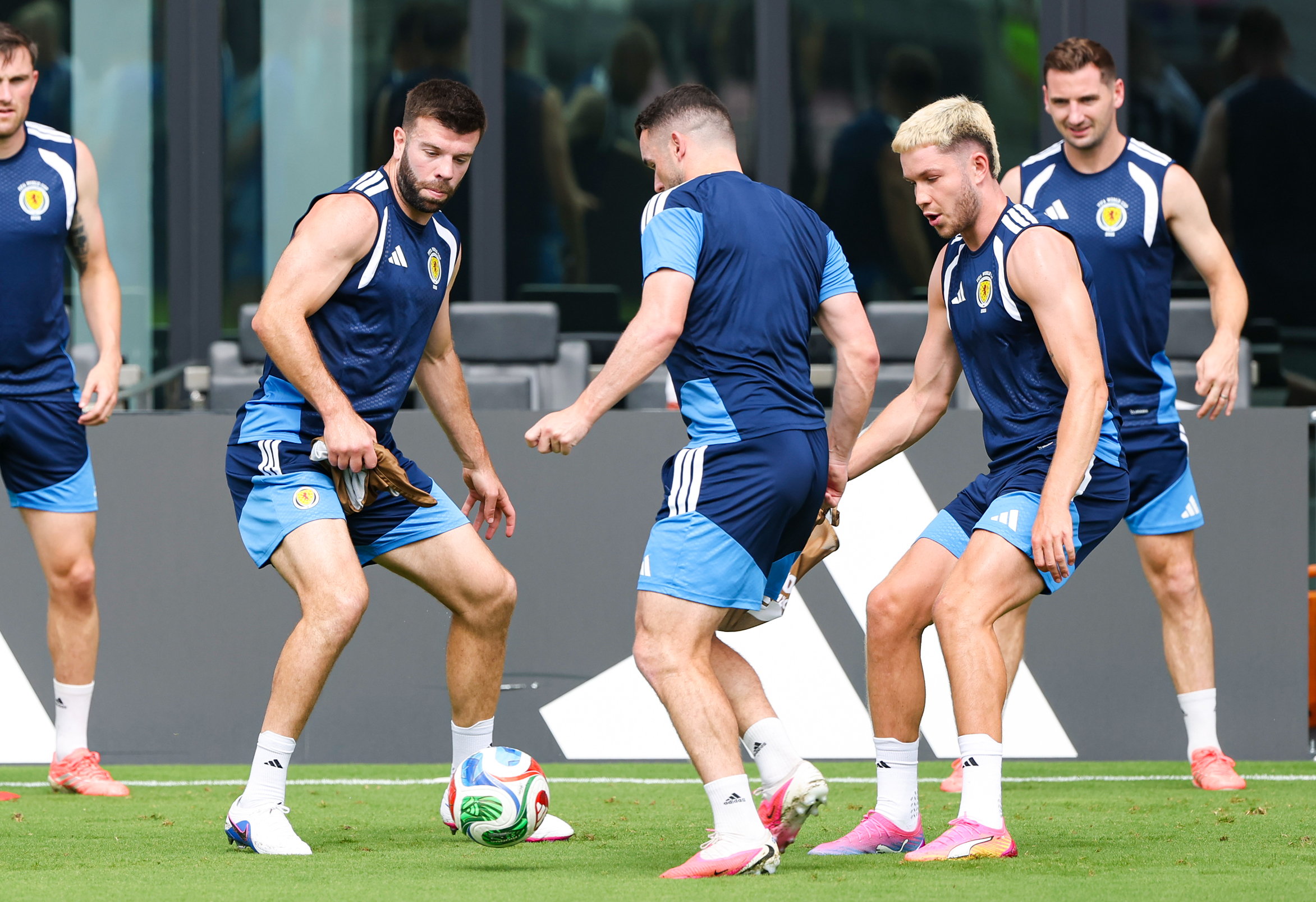 FORT LAUDERDALE, UNITED STATES - JUNE 23: (L-R) Grant Hanley, John McGinn and George Hirst during a Scotland MD-1 training session at Chase Stadium, on June 23, 2026, in Fort Lauderdale, United States. (Photo by Craig Williamson / SNS Group)