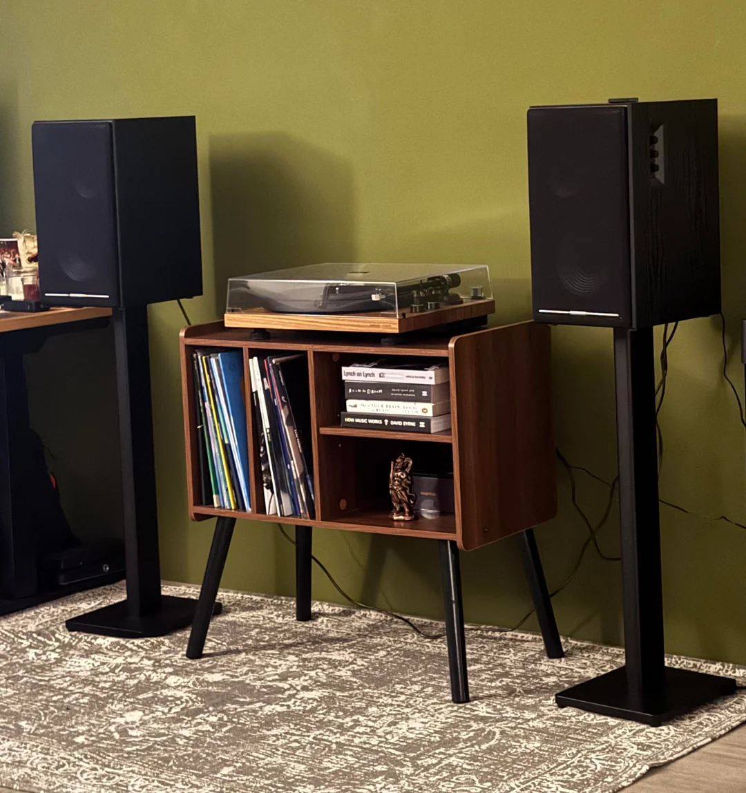 The corner as it looks at home: part listening space, part library.