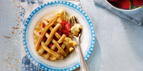 Strawberry and custard lattice tarts