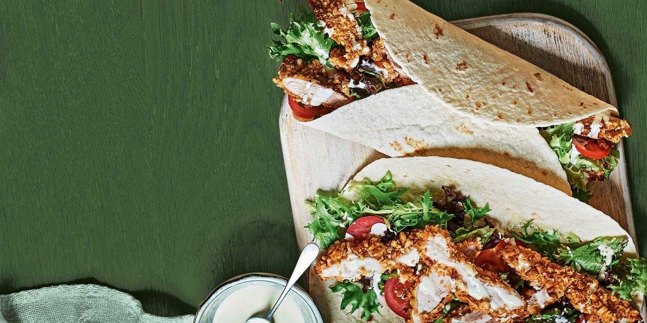 Peanut-crusted chicken wraps