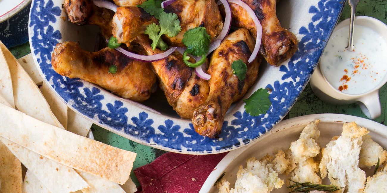 Smoky chicken drummers with lime yogurt dip