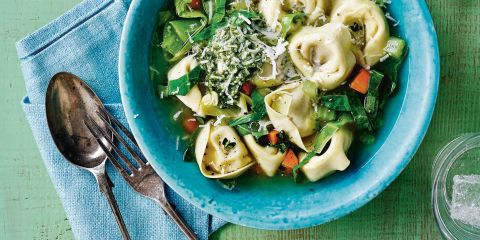 Spring green broth with tortelloni and pesto 