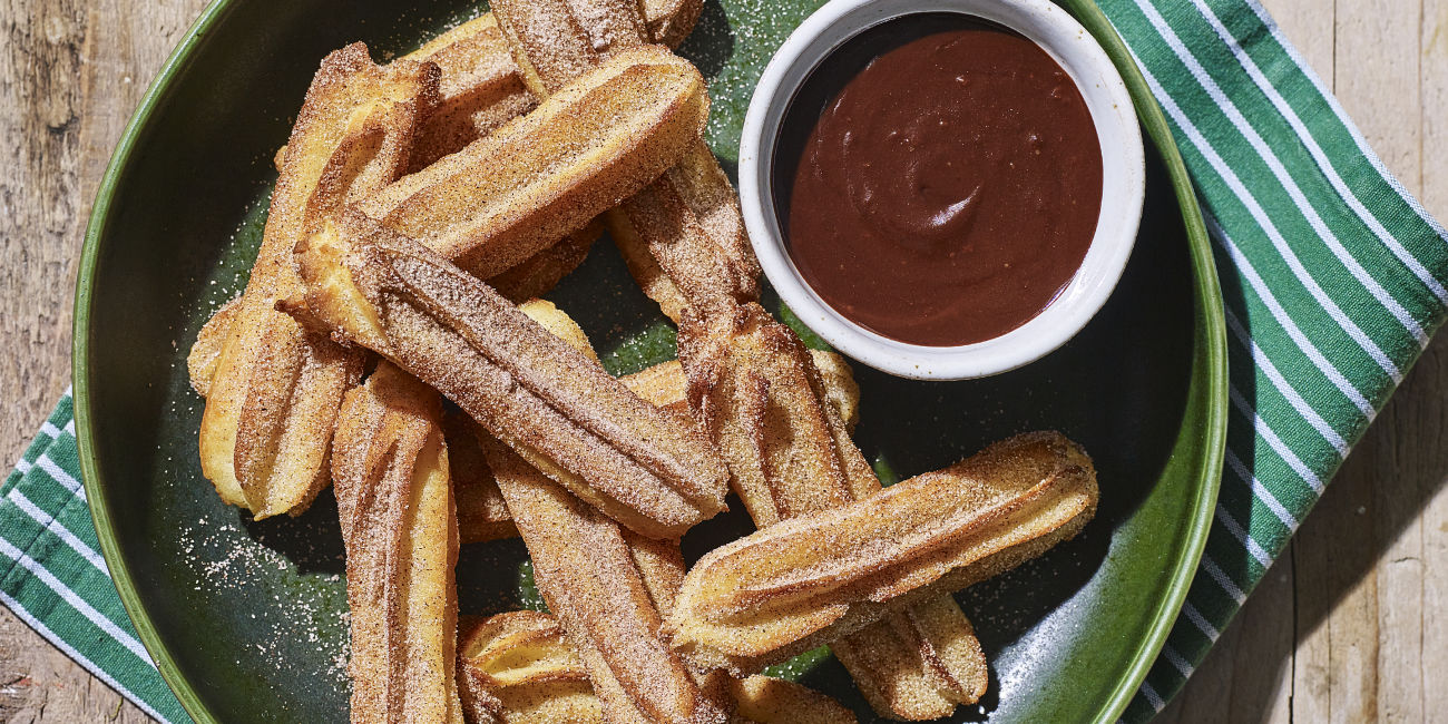 Baked churros with chocolate beer sauce