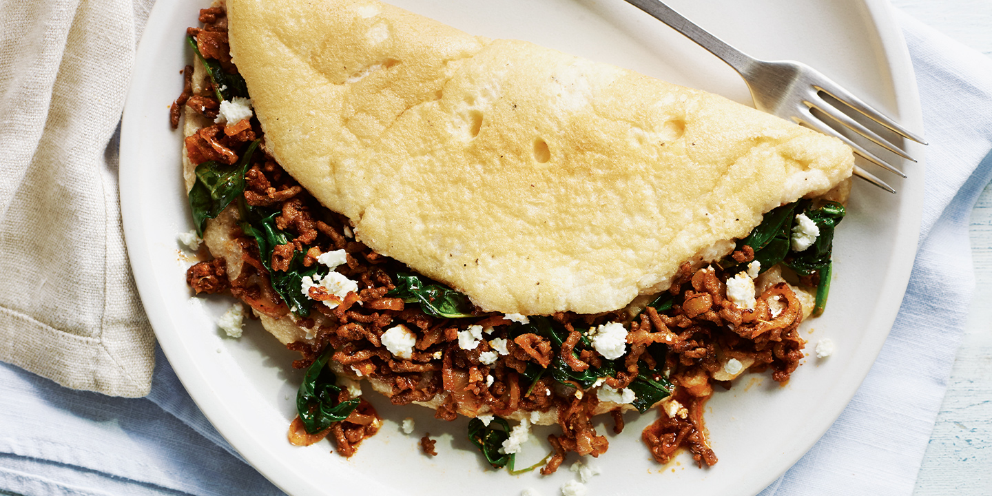 Souffle omelette with spiced beef and spinach