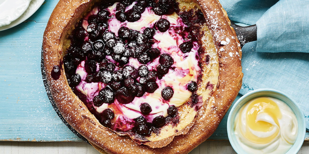 Dutch baby pancake with lemon and blueberries