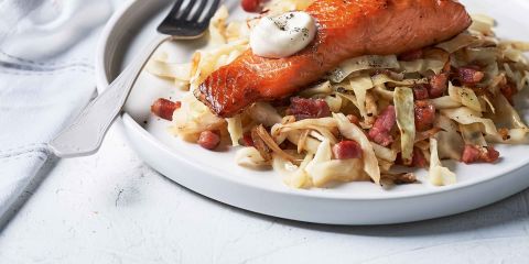 Hot smoked salmon with shredded cabbage and bacon
